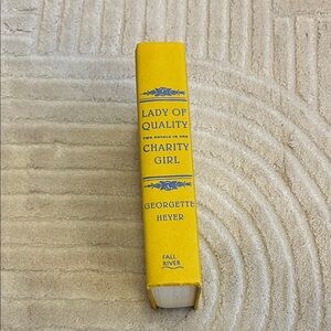 Yellow Hardcover Book by Georgette Heyer